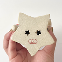 Bottom of a ceramic star shaped base.