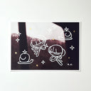 Paint marker illustrations over a photograph of a window view in a car. Drawings are of small cartoon characters with snails.