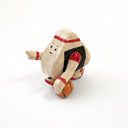 A small hand-painted ceramic figurine of a character resembling an onigiri, wearing red sweatband, and black and red basketball sneakers, holding an orange basketball and pointing, set against a plain white background.