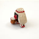 A small hand-painted ceramic figurine of a character resembling an onigiri, wearing red sweatband, and black and red basketball sneakers, holding an orange basketball and pointing, set against a plain white background.
