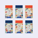 Six colorful packaging designs with Japanese text and graphics on a light gray background