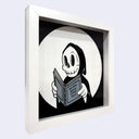 Framed black and white illustration of a grim reaper character holding a book with text reading "not every dream comes true"