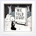 Black and white framed illustration of a cartoon character looking at a large sign that reads "WE TOLD U SO!".