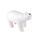 White polar bear figurine on a white background