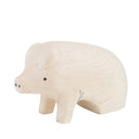 White wood figurine of a pig with a cute smile.