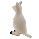 Smooth white wooden figure of a kangaroo with black hand and feet coloring.