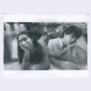 Charcoal drawing of a film still from Fallen Angels, of 2 people sitting with their elbows on a table, one arm raised to hold up their heads.