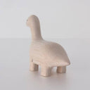 Wooden figure of a dinosaur with a long neck on a white background