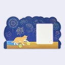 Decorative card with a cat playing with balls on a blue background with fireworks.
