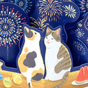 Close up of a decorative 3D greeting card with cats sitting on a table with fireworks going off in the background.