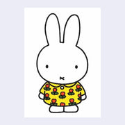 White postcard of Miffy standing and wearing a floral yellow dress with red flower and green leaves.
