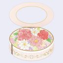 Greeting card shaped like a round floral-patterned box with a lid on a light purple background