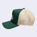 Forest green cap with a white embroidered design of a robot head with an angry stare. Back of the hat is a cream colored mesh.