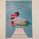 Faux movie poster for "Shizuka Idejima is a BIG OL" featuring posed vinyl figure of a woman leaning over a giant piece of blue sushi.