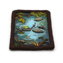 A semi-3D clay artwork, shaped like a card depicting a whimsical forest stream scene with a green frog resting on a rock, surrounded by brown branches, green leaves, and blue-green water, set against a plain white background. Scene is kept within a clay frame made to look like wood.
