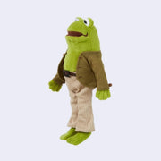 Plush doll of Frog from Frog and Toad, wearing detailed clothing such as a jacket with bead buttons, striped pants and a pleather belt. 