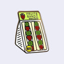 Die cut enamel pin of fruit filled sandwich cut in half, making 2 piece of a triangle packaged nicely in plastic wrapping, with their centers facing out. The top of the package reads "Fruits Sando / Giant Robot"