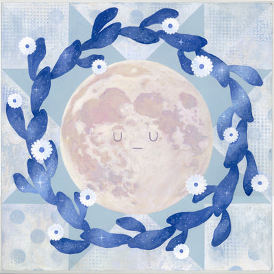 Painting of a moon with a small, simple closed eye expression. It is surrounded by a wreath made of cacti with blooming flowers. Background is a blue and white geometric quilt inspired pattern.
