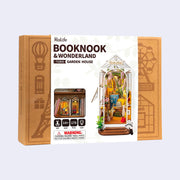 Product packaging for Booknook & Wonder kit, Garden House. Features photo of fully assembled greenhouse garden themed booknook diorama.