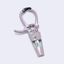 Purple garden shears on a light purple background