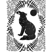 Black paper cutting art. A wolf sits and holds a star in its mouth, it is framed by delicately cut fern leaves and flowers and a full moon.