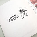 Signature on the inside of a booklet by Gemma Correll logo with a stylized illustration of a herself.