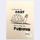 Drawing of an angry, passionate cartoon turtle with text "I may not be fast but I sure am Furious"