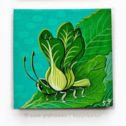 Painting of a bok choy made to look like an insect, with bok choy leaves as wings. It sits on several leaves. 