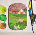 Painting on a wooden panel with rounded edges of 2 fluffy chickens on a farm with rolling green hills and a pink barn house.