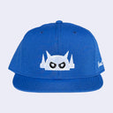 Blue cap with a white logo on a light gray background