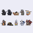 Collection of various toy figurines on a white background