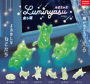 Green cat-shaped glow-in-the-dark figures with 'Luminyasu' branding on a blue background.