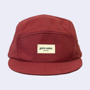 A classic five-panel camp cap in a deep burgundy red, featuring a beige rectangular patch on the front with the brand name 'giant robot' and 'SINCE 1994' in black script.
