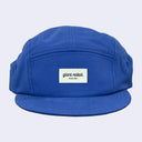 A royal blue five-panel camp cap with a white rectangular front patch reading 'giant robot SINCE 1994', shown on a light gray background.