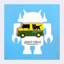 A small enamel pin shaped like a yellow and green delivery van with a black cat graphic and Japanese text, displayed on a blue card with a white giant robot silhouette. The card also reads 'giant robot' and 'sawtelle japantown'.
