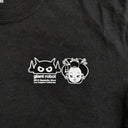 Black t-shirt with white cartoon character and 'giant robot' logo on a plain background