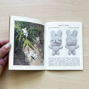 Open booklet showing 2 pages from the Gumi Buni Zine.