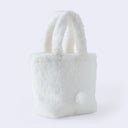 Fluffy white faux fur handle bag with Hello Kitty's face on the front, she has 3D fluffy ears, a pink box and kawaii eyes. Backside has a small 3D round tail.