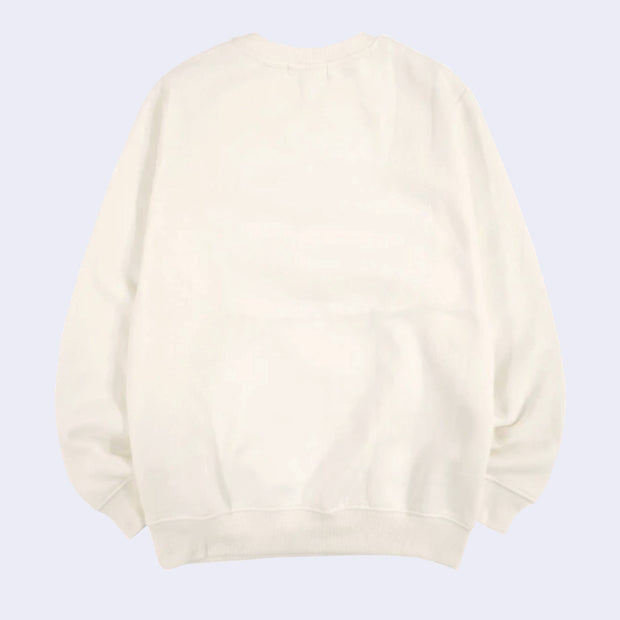 Back of off white pull over sweater, without any graphics.