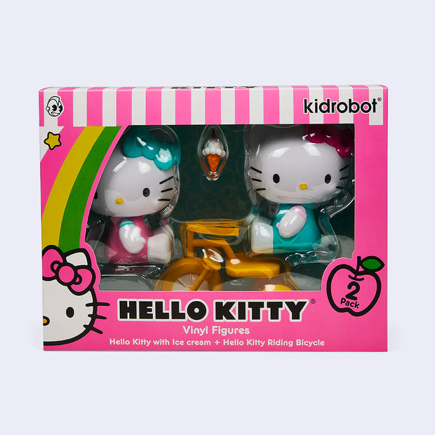 Product packaging for Hello Kitty 2 pack art figure set. Packaging is pink with a clear window that shows figures inside.
