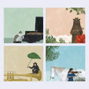 Memo pad sheets arranged in a 2x2 grid featuring whimsical scenes: a cat playing a grand piano, a bear playing a guitar with a red flower, a monkey sitting on a trumpet under a green leaf umbrella, and a woman playing a violin beside a white horse.