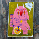 Painting of a cute, pink monster holding a banjo and smiling. It says "I Want Your Soul"
