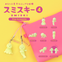 SMISKI strap accessories with a pink pouch on a yellow background