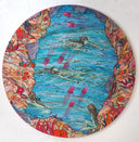 Painting on circle panel of a river, surrounded by colorful land with orange plants. 4 fish like woman swim in the lake, where pink jellyfish intermingle with them.