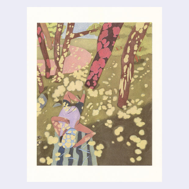 Risograph print of a person laying in the grass on a blanket, with trees around and sunlight coming through the leaves.