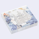 Notebook with artistic cover featuring a character and the brand 'Katachi' on a light gray background.
