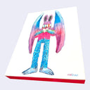 Artwork of a blue and pink bat character holding a heart.