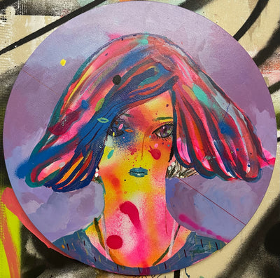 Portrait painting on purple circle panel of a woman, abstract in shape with big hair, cut above her neck. Painting is colored liberally with bright blues, pinks and yellows and lots of splatter and spray paint textures. 