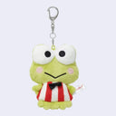 Plush frog keychain with a red and white striped shirt on a light gray background