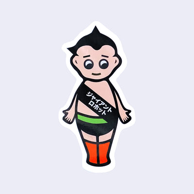 White outlined die cut sticker of a Kewpie baby, dressed as Astro Boy with a black sash that has Kanji written on it.